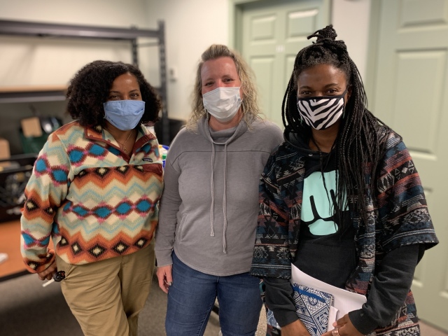 Ruth Arias and Airiel Peoples from Bright Spot Urban Farm visited with Jenn Williams (center).